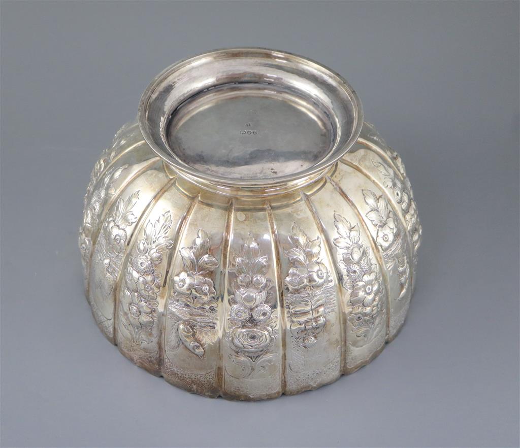 A late Victorian embossed silver presentation punch bowl, by Thomas of New Bond Street, London, 1890,